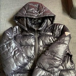 Men’s Coat with small snag on arm.